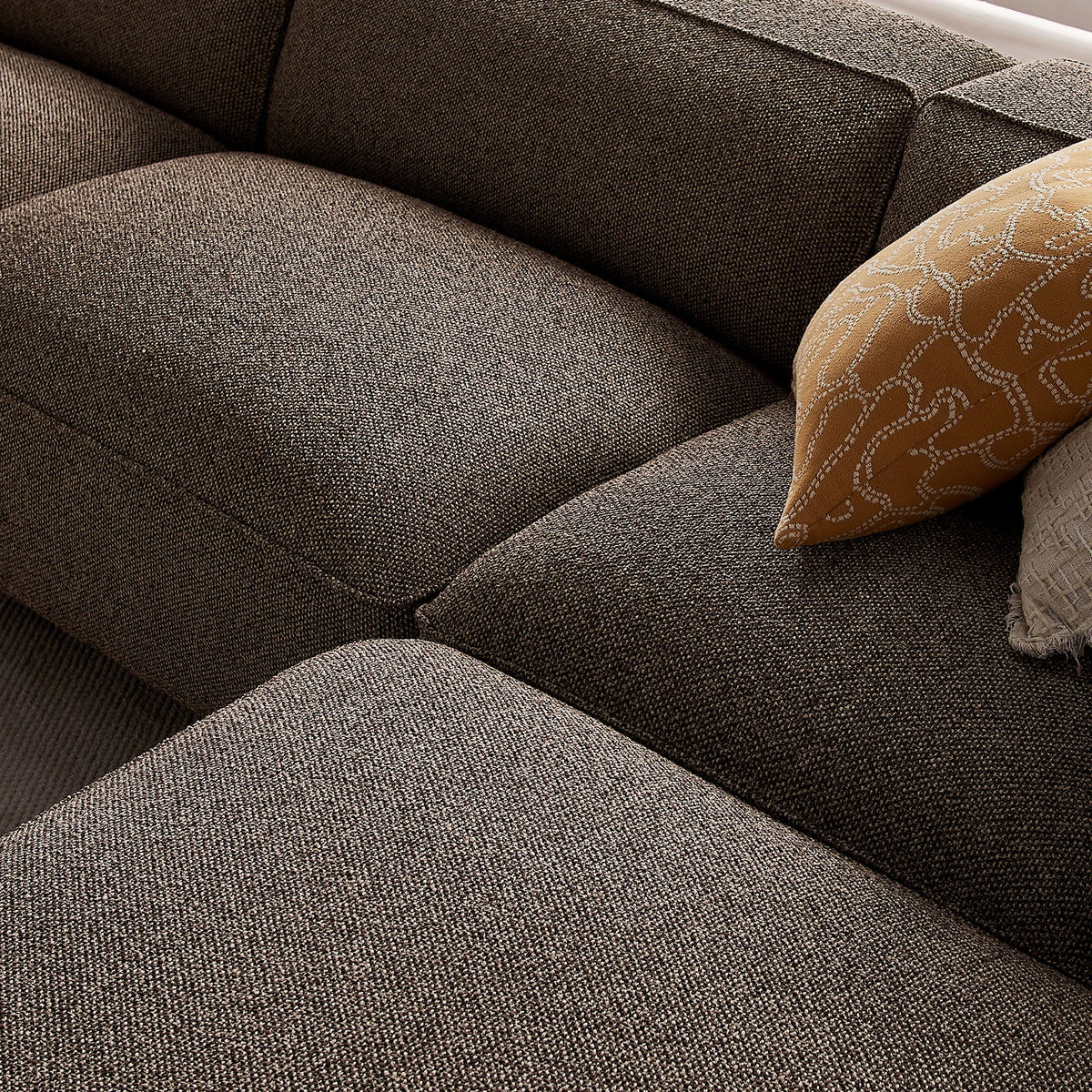 Canapé modulaire Auren 4 pièces en bouclette, motif treillis, avec pouf