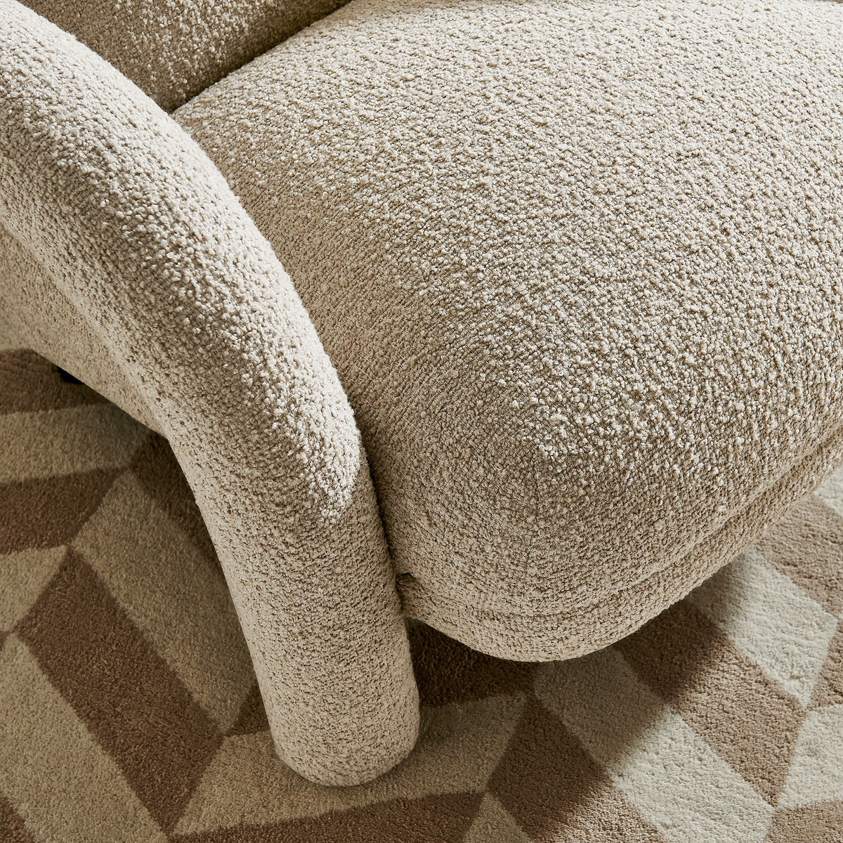 Fauteuil rembourré en tissu texturé Ferris