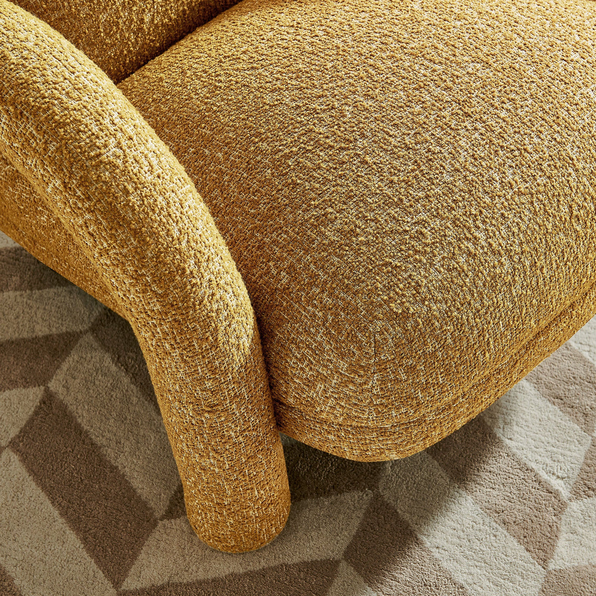 Fauteuil rembourré en tissu texturé Ferris