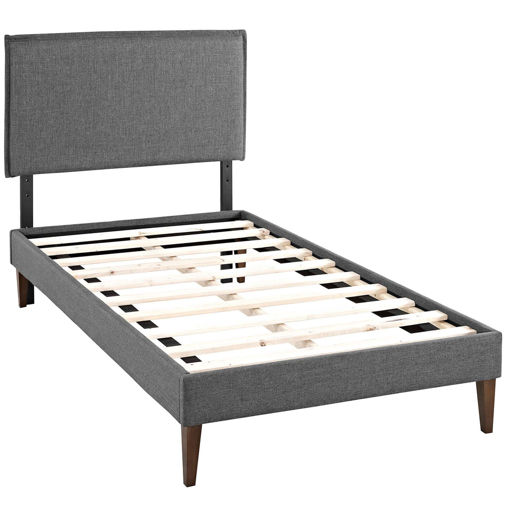 Lit plateforme Amaris en tissu avec pieds carrés effilés